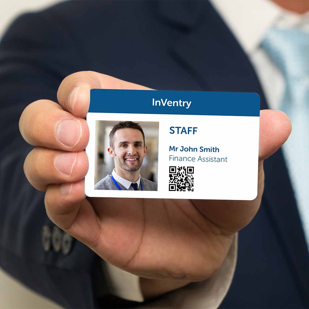 Person holding an InVentry ID Card