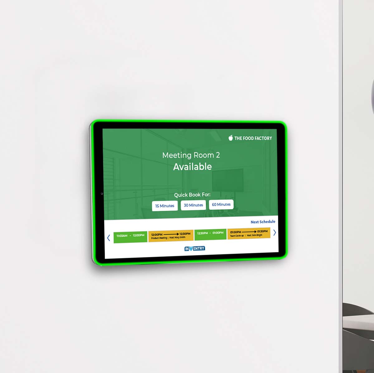 Space Bookings Device on a wall showing meeting room as available