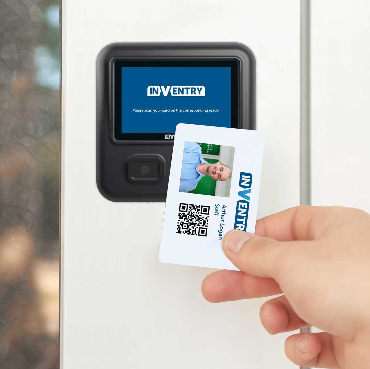 Person scanning an ID card on an InVentry Quickscan device