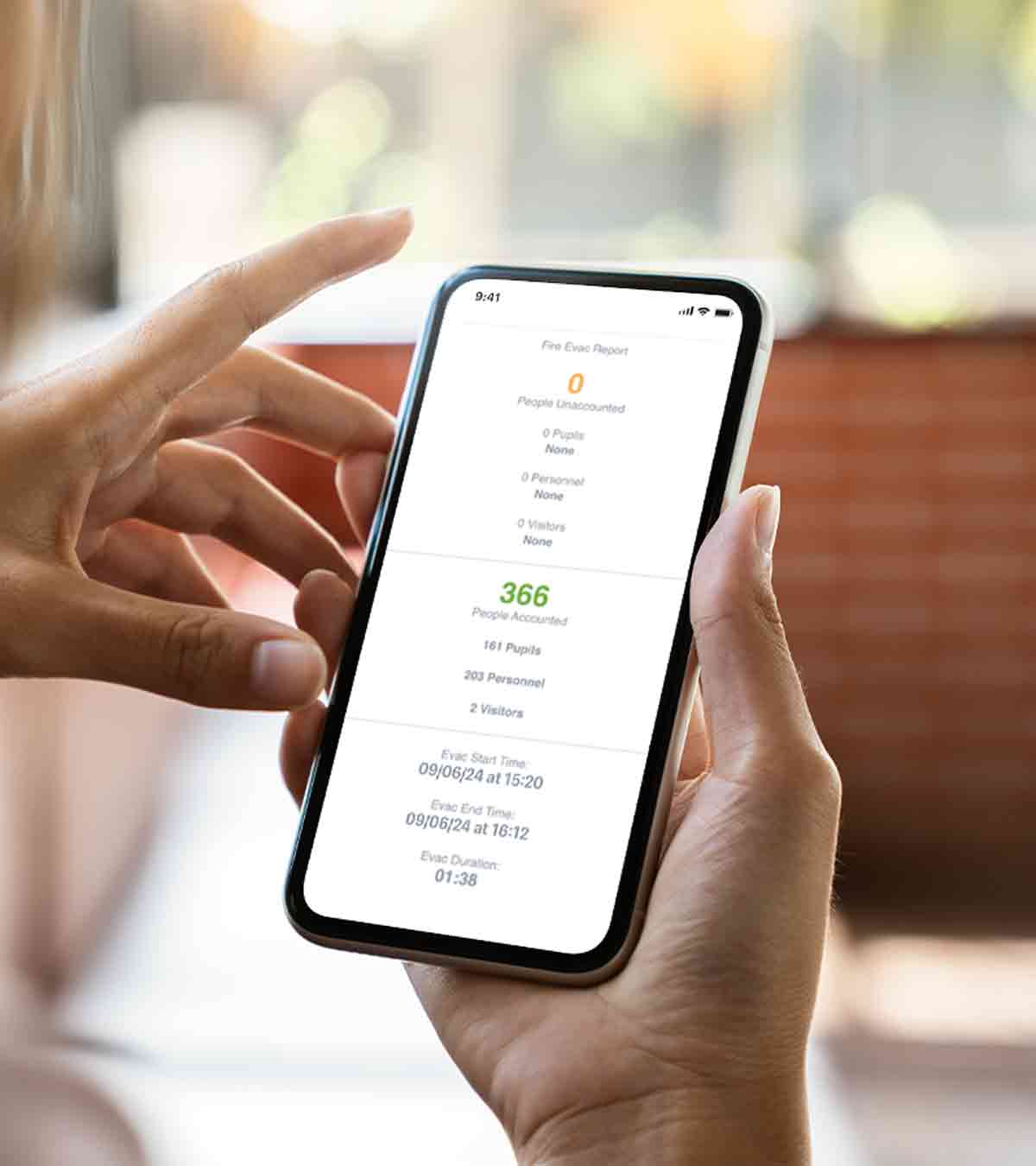 Person viewing Evacuation Report on Phone