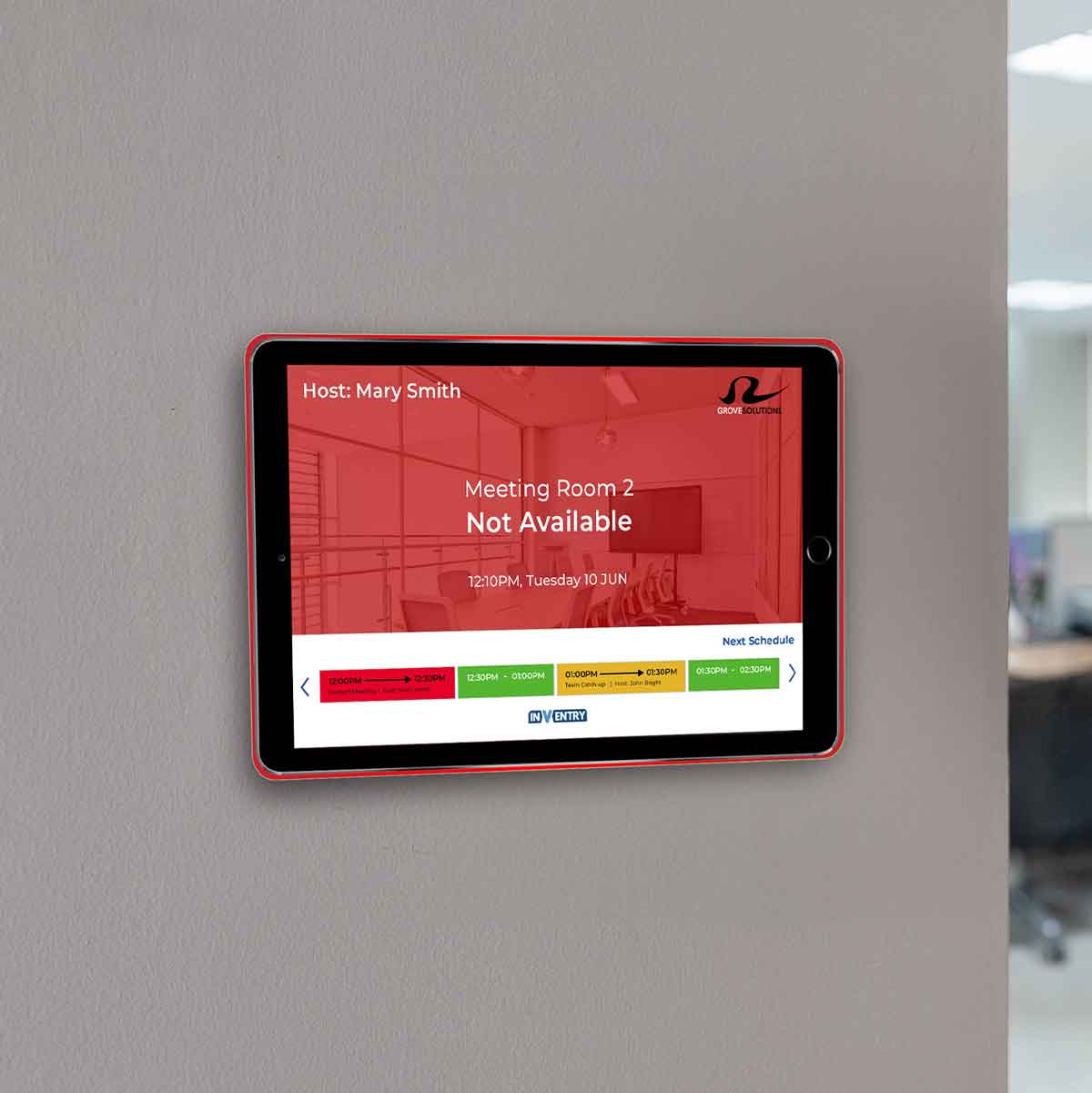 Space Bookings Device on Wall showing room as unavailable